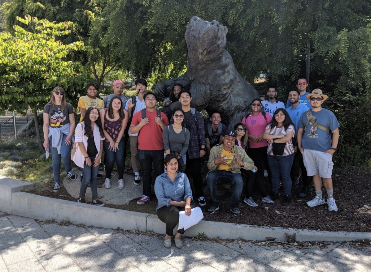 A group of Summer Bridge students poses in front of the UC Berkeley bear