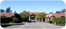 image of Front Entrance to Solano Community College, arched walkway into Library and Administrative buildings.