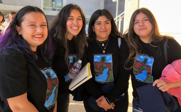 Four Puente Students at a conference