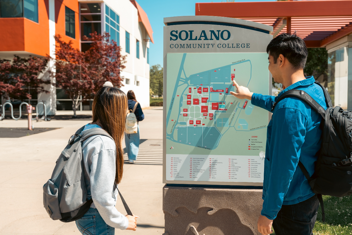 students looking at map