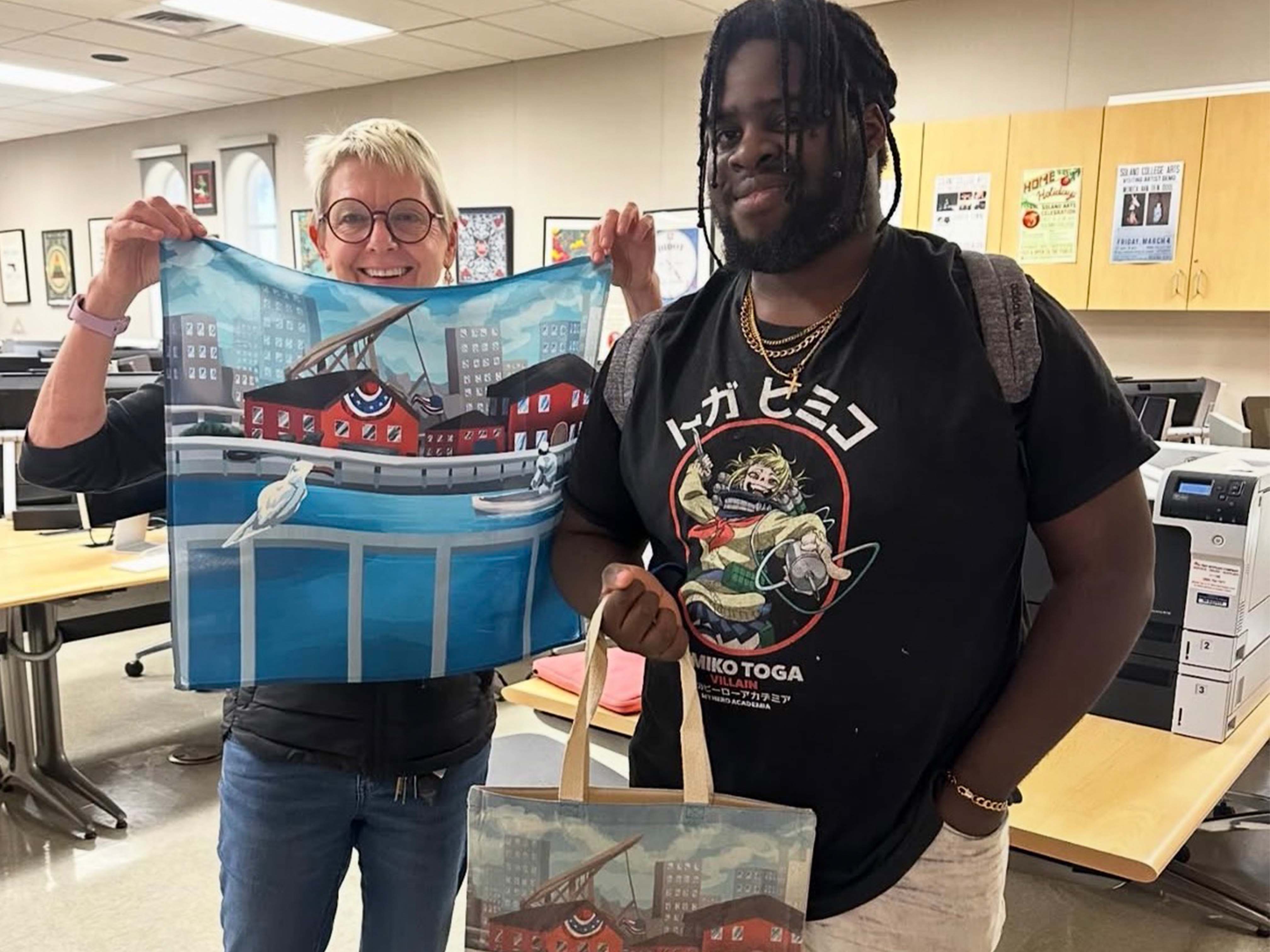 Basa and instructor Sarah showing off the prints from the dye-sub printer