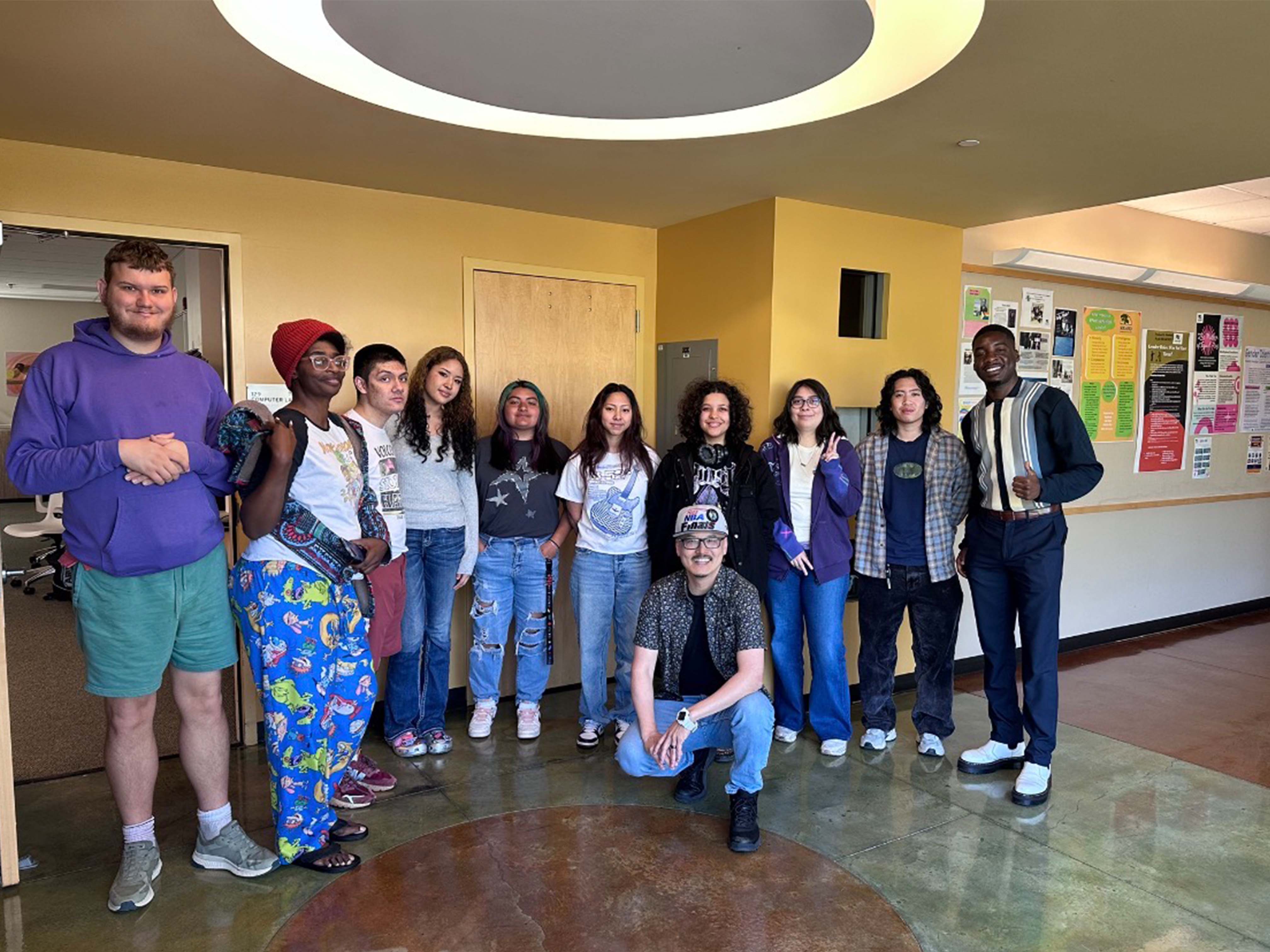 DMA class posing with the Bridgegood reps