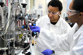 Image of Students Working with Bioreactor Image of Students Working with Bioreactor