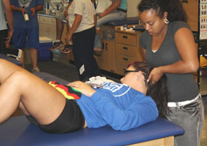 Student treating a player