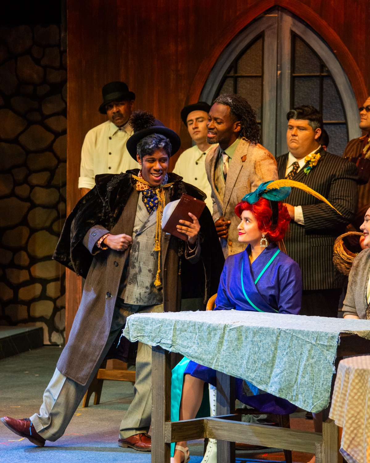 People performing on stage in costume